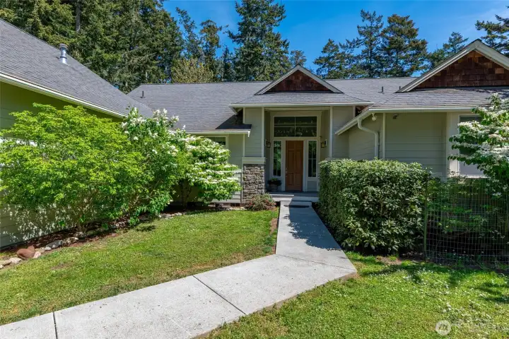 Invite your guests down this neat front path from your parking area to your front door.