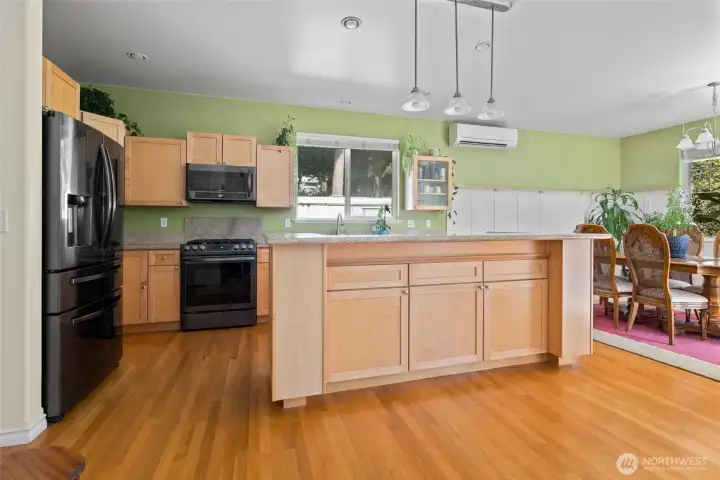 Kitchen with eat-in island.