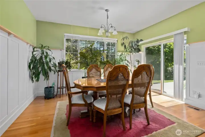 Dining room with sliding glass doors to deck.