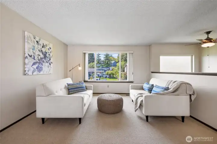 Light filled living room with views of Mt Rainier on a clear day!