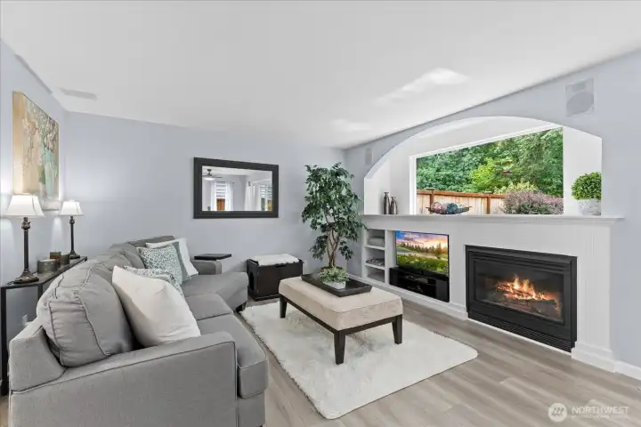 This is a living room you will love to spend time in. Very bright and cozy, this space features an open-concept layout filled with natural light, perfect for both relaxing evenings and entertaining This is a living room you will love to spend time in. Very bright and cozy, this space features an open-concept layout filled with natural light, perfect for both relaxing evenings and entertaining
