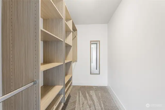 Primary Walk in Closet with Built Ins