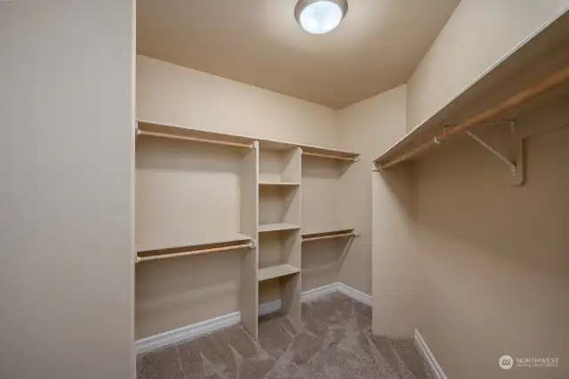 Look at this amazing closet. It has so much organizing opportunities. You may find that one closet will meet all or your needs and leave the other rooms' closets for other uses.