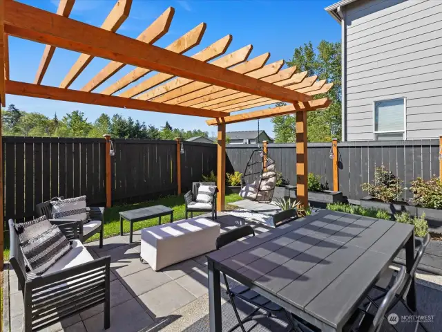 Enclosed within a fully fenced perimeter, the backyard offers a sense of seclusion and security, providing a peaceful retreat where you can unwind and enjoy the beauty of nature in complete privacy.