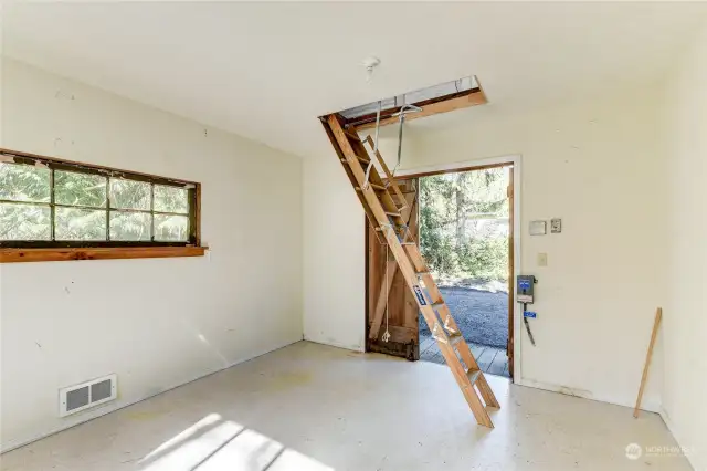 Pull down ladder for easy attic access.