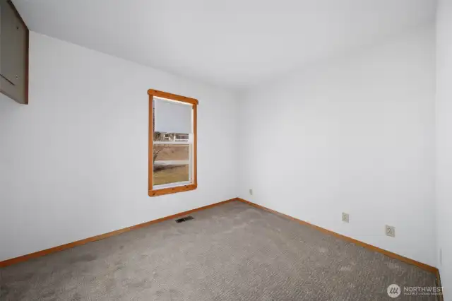 Bedroom #2 with new carpet.