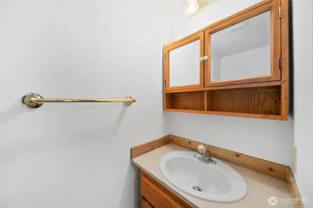 1/2 bathroom (sink & toilet) on main floor, with new flooring.