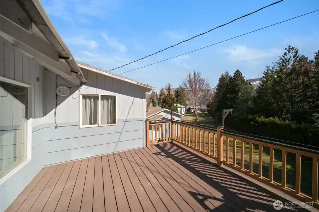 Back deck off of screened-in porch and over-looking the back yard.
