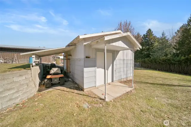 Work shop with storage for yard equipment.