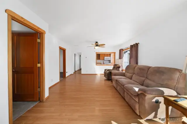 Living room with pass-through to kitchen.