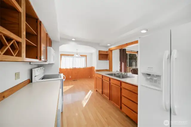 Kitchen (with pass-through) looking into dining room.