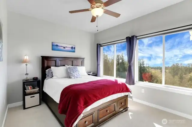 Primary bedroom with walk in closet and modest en-suite b