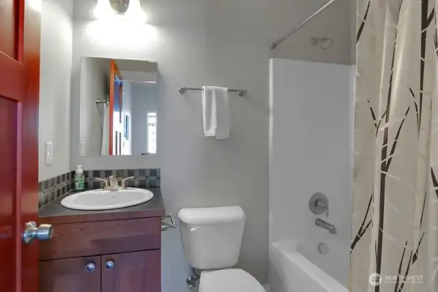 ensuite bath to second main floor bedroom