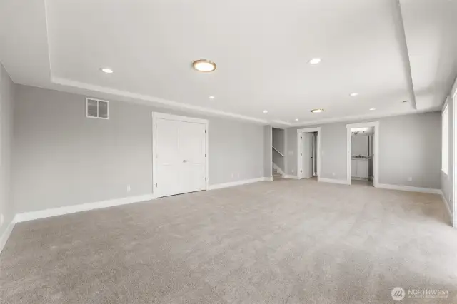 A party-sized lower recreation room for all your entertaining needs.