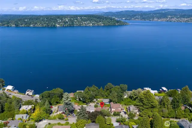Expansive views! Mercer Island in the foreground, Renton shoreline to the east against a backdrop of the Cascades, Mt. Baker takes the center crown on a clear day!