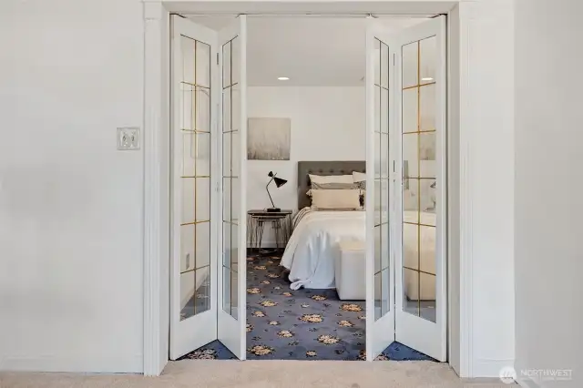 This downstairs 3rd bedroom may not be conforming, there is no window egress. There are 2 ways to exit towards the basement egress door-one directly across from the egress doors and the other into the hallway.