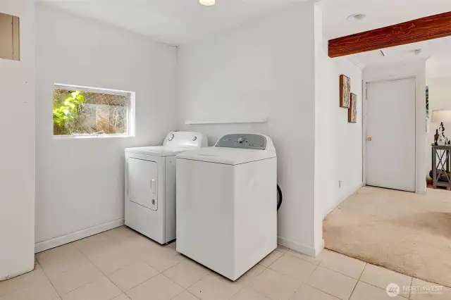 Spacious laundry room-share it with your craft and hobby gear.