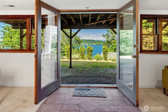 This set of French doors opens to the backyard and gardens.