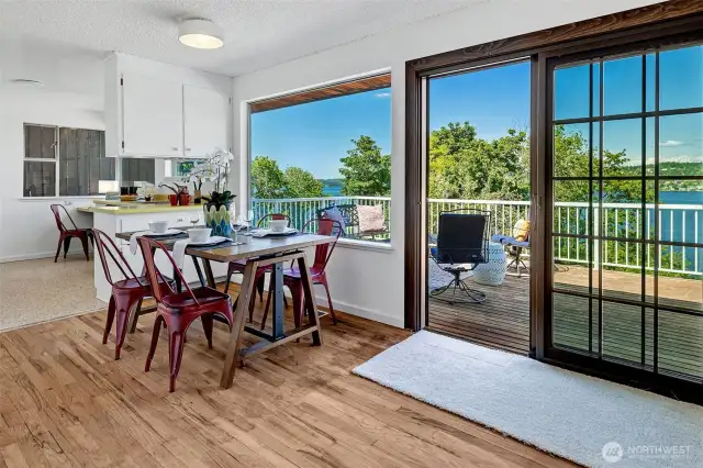 Well-engineered liveble design. Everyone can glide smoothly from inside to outside, plenty of space on the deck for special entertaining, large gatherings- front row seats to Seafair's Blue Angels!