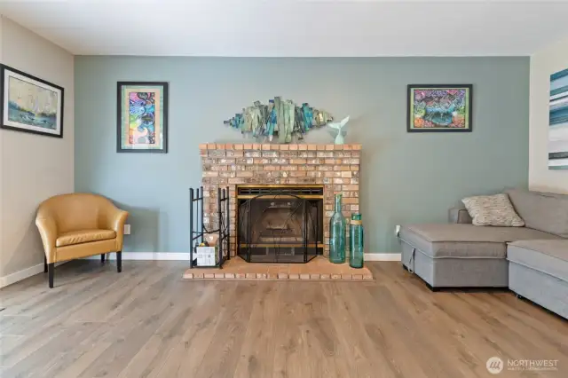 Wood fireplace - stay toasty in the winter. This is the living room.