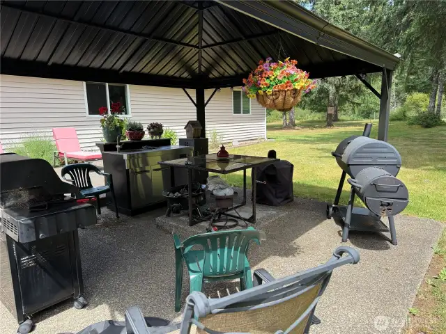 Outdoor kitchen, gazebo and entertaining space