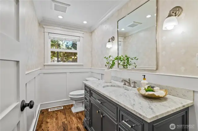 A half bathroom upstairs adds convenience for guests, family, and friends