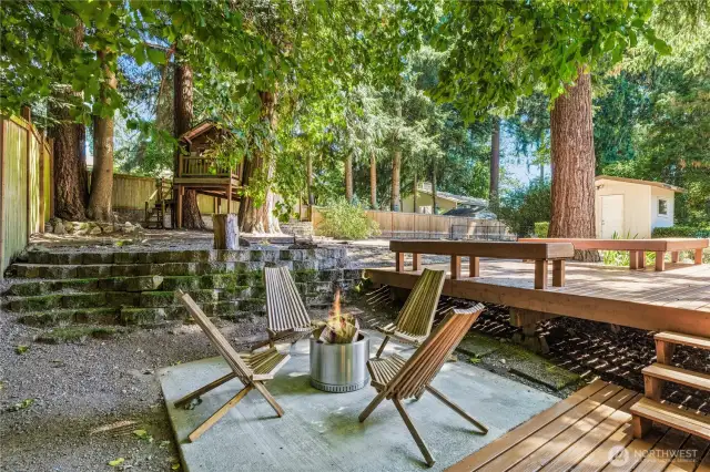 This patio space can be used for a fun firepit or the space for your future hot tub - the hook ups are already installed and ready to go!