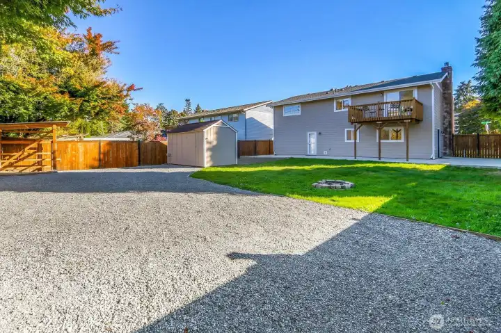 Fully fenced backyard with beautifully stained fencing.