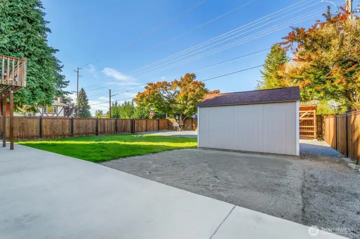 Large shed or workshop with RV hookup inplace.