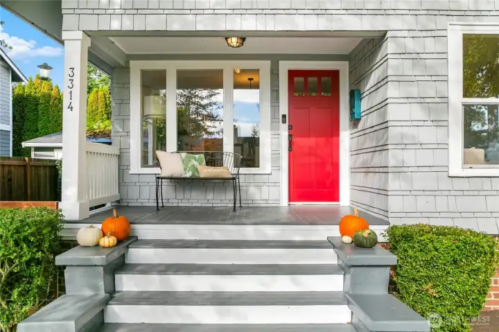 Super cute and welcoming front porch.