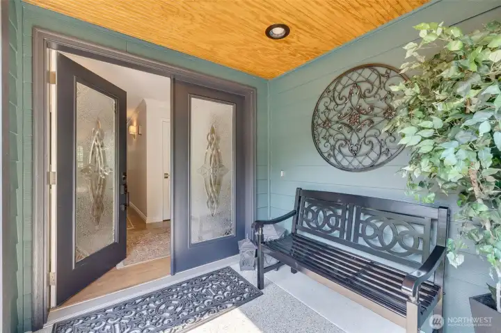 As you step through the front door, you’re welcomed by a grand entryway that sets the tone for the entire home.