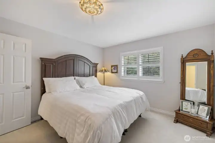 From this perspective, the 2nd bedroom showcases its spacious layout and abundant natural light.