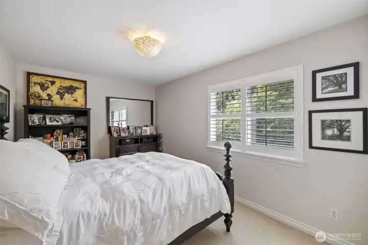 The third bedroom is bright, spacious, and thoughtfully designed for comfort and versatility. Large windows fill the room with natural light.