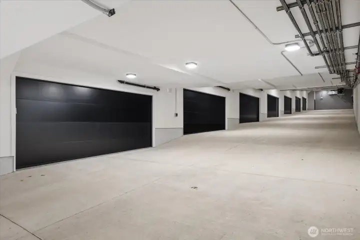 Striking commercial-grade, industrial garage crafted with over 14 million pounds of concrete—bold, rare, and architecturally impressive.