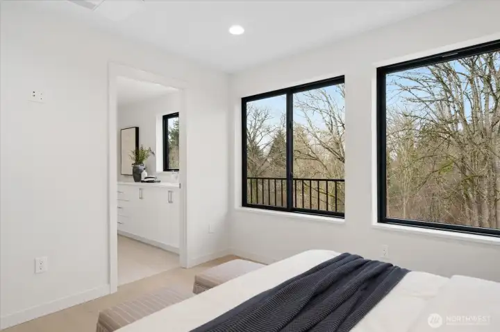 Comfortable retreat with generous windows for unobstructed views of nature year round.