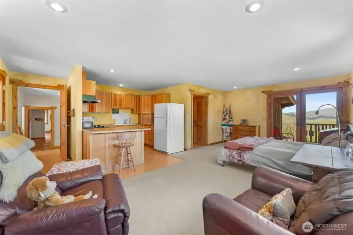 Fully independent studio apartment with full kitchen, full bath, free-standing propane stove, private entrance and two private porches.