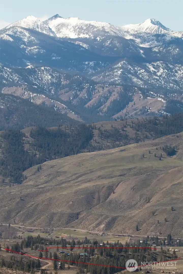 117 Vintin Rd is at the bottom of this photo with the approximate property lines (where not hidden by hills) shown in red. A bit slower and quieter than the towns further up-valley, Carlton is nestled by the river below the dramatic Sawtooth Mountains. If you are looking for peace and quiet in a beautiful landscape, you won't find it's match with this level of infrastructure elsewhere.
