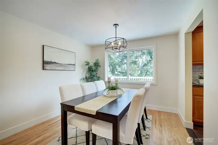 Dining room just between living room and kitchen