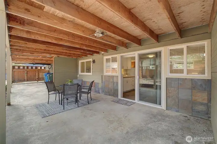 Opens to covered and expansive patio