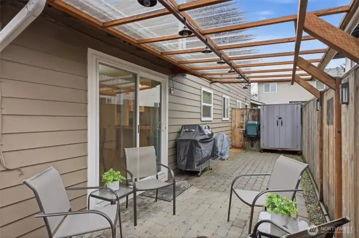 Backyard patio with covered area to enjoy yearround