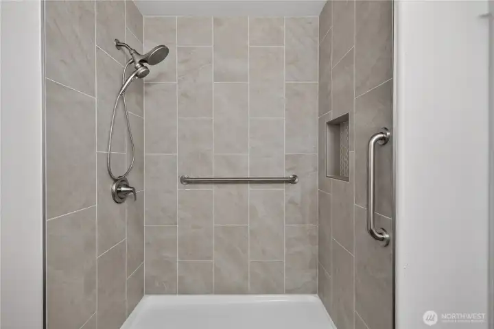 Bathroom with walk in tiled shower