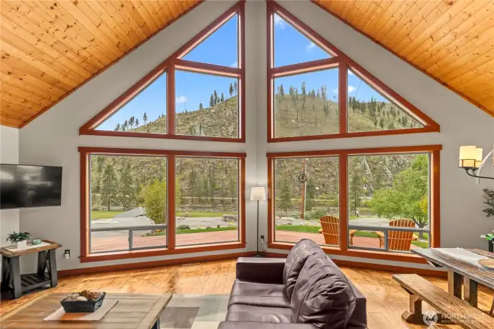 South facing, huge windows brings river and nature views inside.