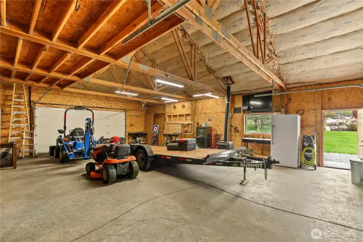 Garage doors at both ends provides easy drive through option, or a way to let all the sunlight in during warmer weather.