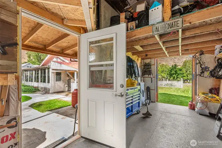 Inside shed space with additional loft storage.