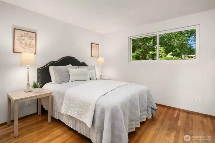 All bedrooms enjoy hardwoods and nice light