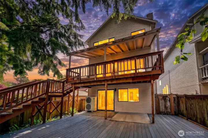 Warmly welcoming and thoughtfully designed, this multi-level contemporary home balances privacy, flexibility and low-maintenance living in the heart of Wedgwood.