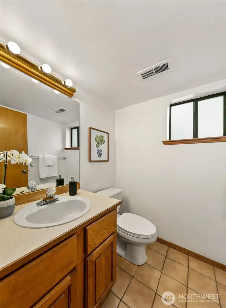 Conveniently positioned adjacent to the family room and outdoor living spaces on the entry level.