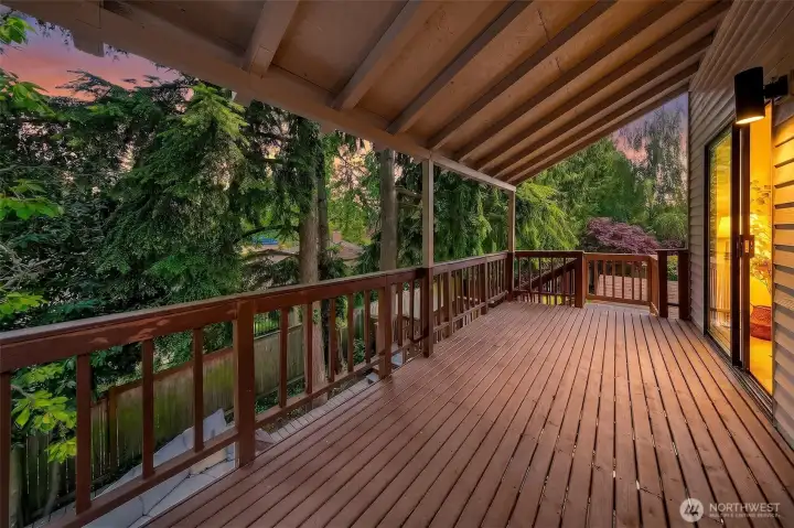 Protected from the elements and generously sized, this covered deck functions as an additional living room for much of the year.