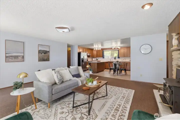 Living room with wood burning fireplace - cleaned and inspected in 2025. Living room with wood burning fireplace - cleaned and inspected in 2025.