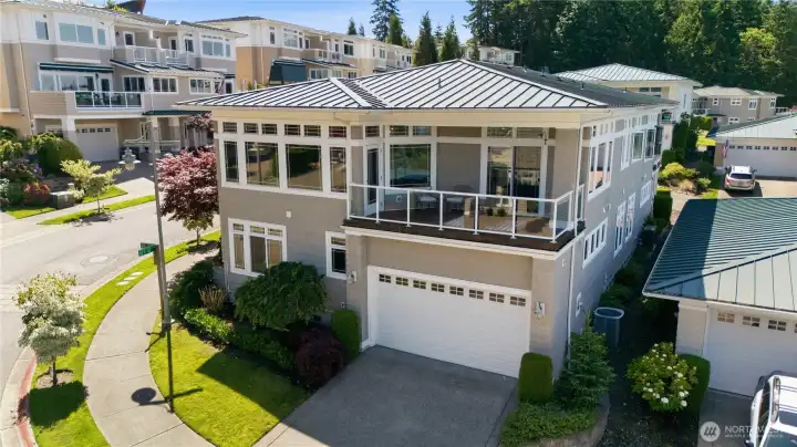 Low maintenance, luxury living with this beautiful Gig Harbor Condo which features a corner unit with views